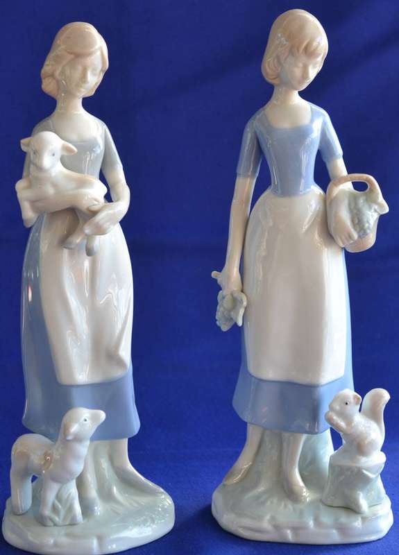 Pair of Heritage Porcelain Figurines