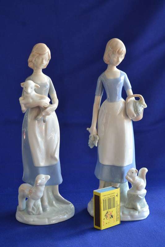 Pair of Heritage Porcelain Figurines