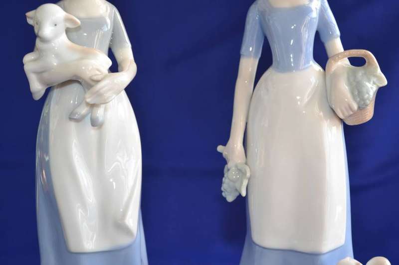 Pair of Heritage Porcelain Figurines