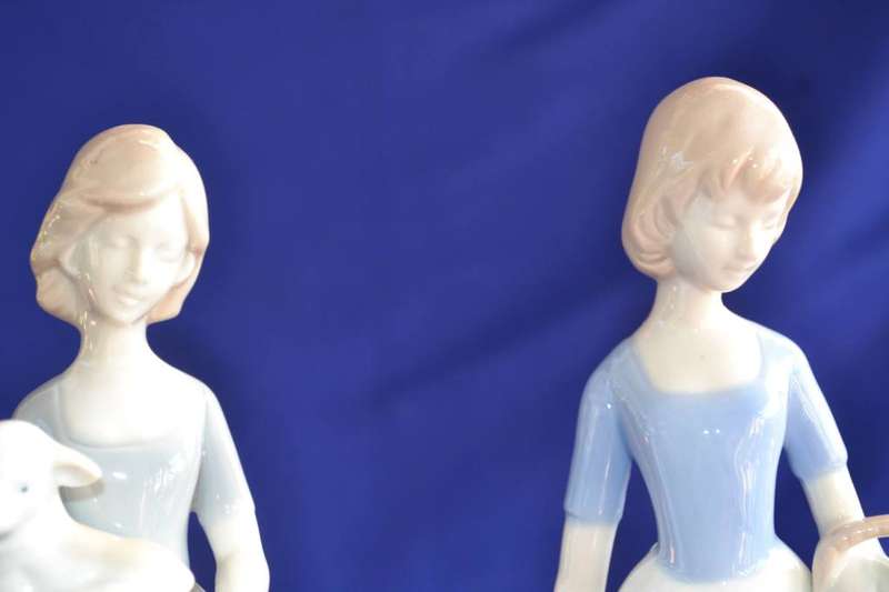 Pair of Heritage Porcelain Figurines