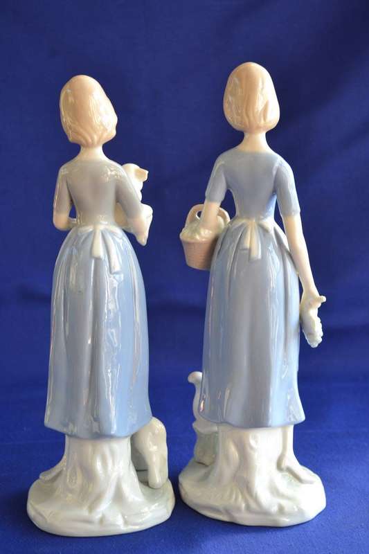 Pair of Heritage Porcelain Figurines
