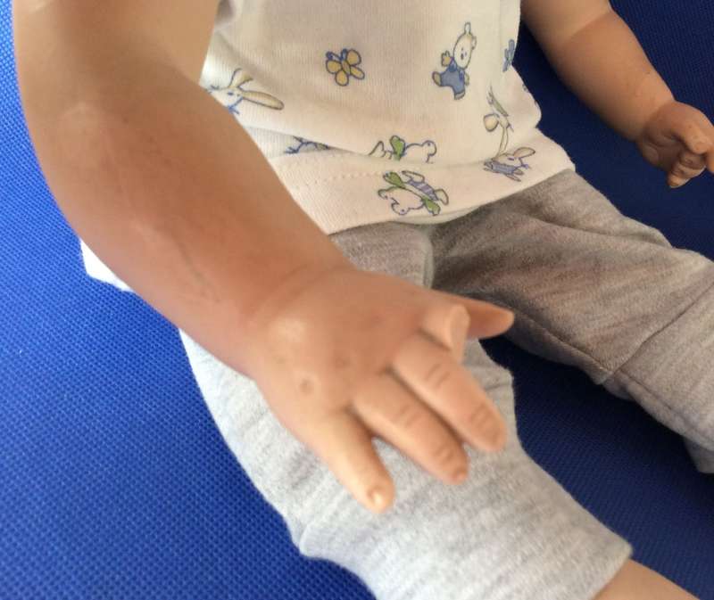 Porcelain Doll - Sitting Position