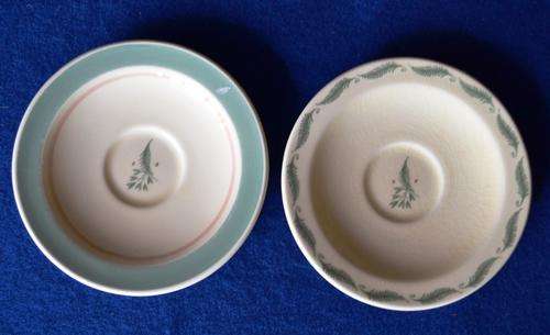Two Susie Cooper Saucers