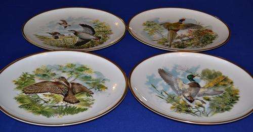 A Set of Four Royal Chelsea "Birds of the Countryside" Decorative Plates