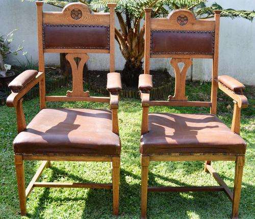 Two Oak and Leather Carver Chairs