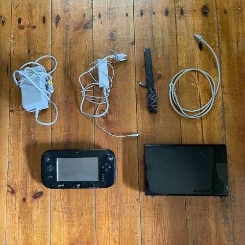 Wii U with 12 games including Wiimote and Nunchuck for Sale