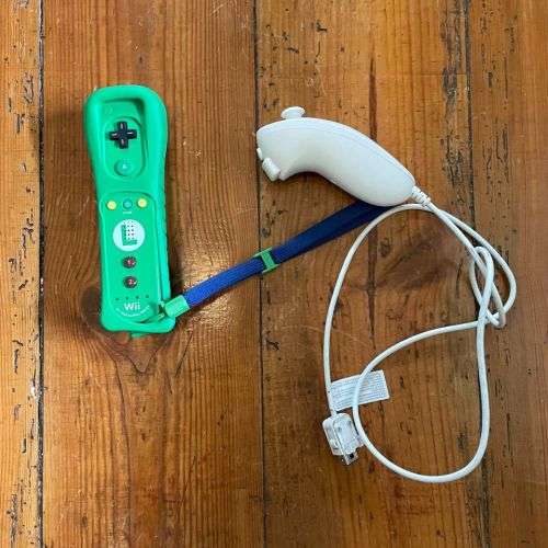 Wii U with 12 games including Wiimote and Nunchuck for Sale