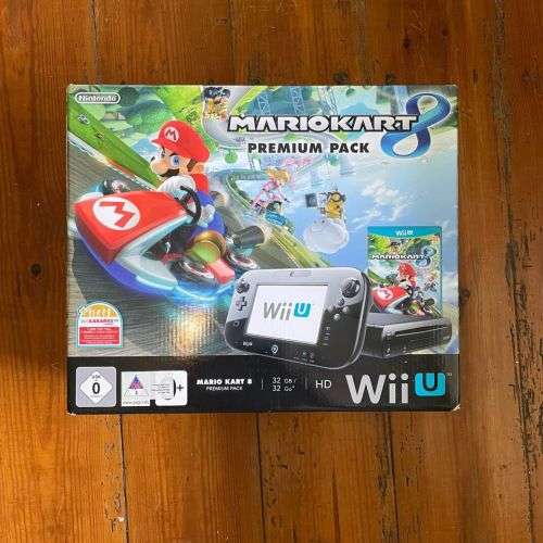Wii U with 12 games including Wiimote and Nunchuck for Sale