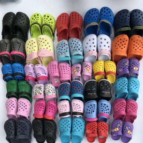 40 children's shoes in bulk.