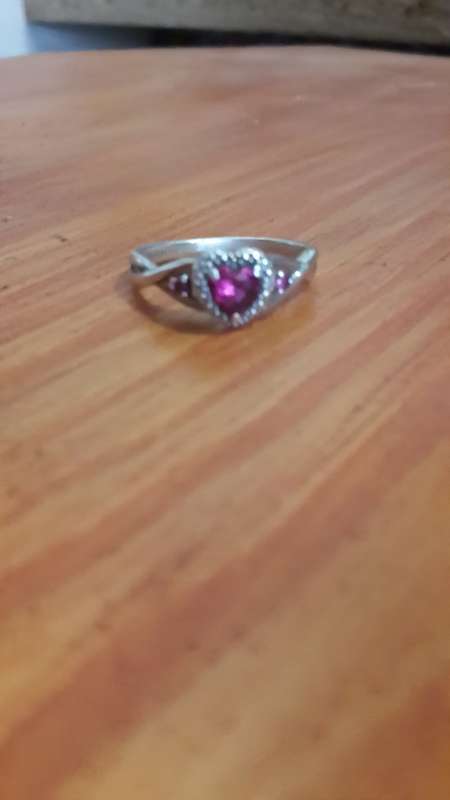 Silver ring with genuine ruby