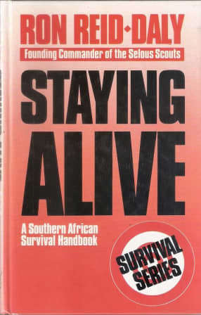 SCARCE! RON REID-DALY `STAYING ALIVE - A SOUTHERN AFRICAN SURVIVAL HANDBOOK` FIRST EDITION, 1990