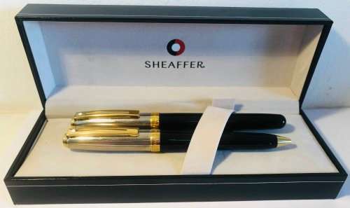 SHEAFFER SAGARIS ROLLERBALL PEN AND BALLPOINT PEN, BLACK AND SILVER BARREL WITH GOLD TRIM IN BOX