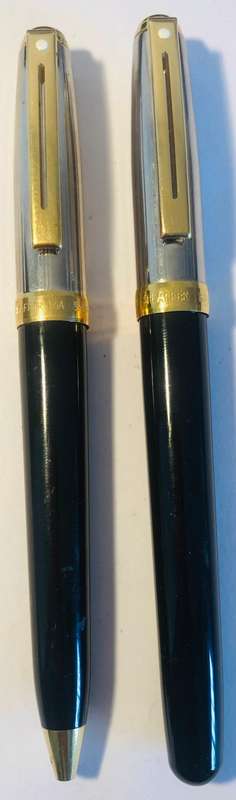 SHEAFFER SAGARIS ROLLERBALL PEN AND BALLPOINT PEN, BLACK AND SILVER BARREL WITH GOLD TRIM IN BOX