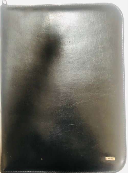 BLACK BUSBY LEATHER A4 FOLDER IN EXCELLENT CONDITION, EMBOSSED WITH PLAVIX LOGO ON INSIDE OF FOLDER