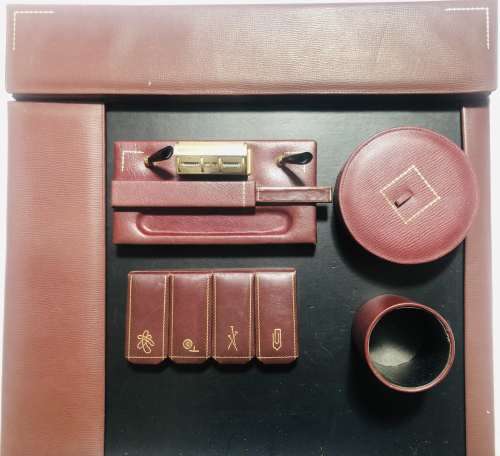 MATCHING MAROON LEATHER DESKTOP SET: DESKTOP CALENDAR HOLDER, 4 STATIONERY HOLDERS MANUAL CALENDAR