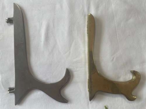 DOUBLE SET OF BOOK STANDS (BRASS AND SILVER)