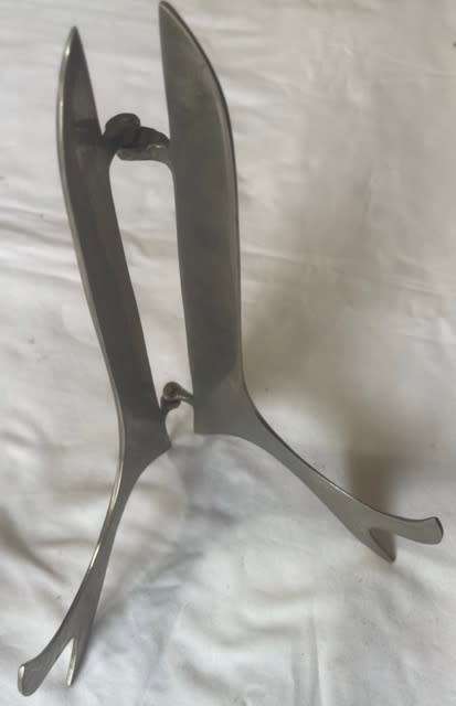 DOUBLE SET OF BOOK STANDS (BRASS AND SILVER)