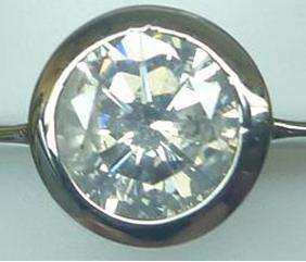 0.75CT ROUND CUT SOLITAIRE RING SET IN 9CT WHITE GOLD