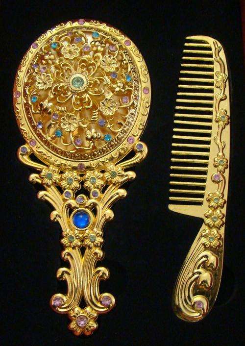 ANTIQUE GOLD MIRROR AND COMB SET WITH SIMULATED GEMSTONES