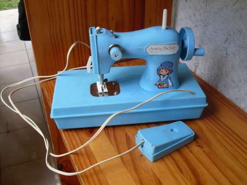 VINTAGE BLUE CHILD'S TOY SEWING MACHINE (HAND CRANK & BATTERY OPERATED)