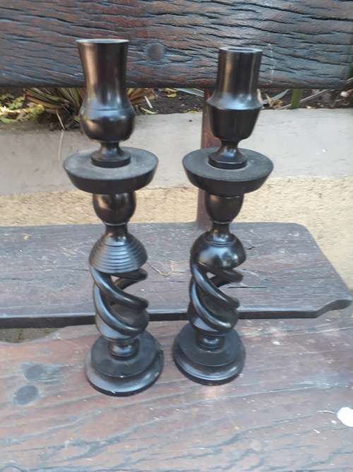 A PAIR (NOT MATCHING) OF EBONY? CANDLESTICK HOLDERS. NICE DETAIL