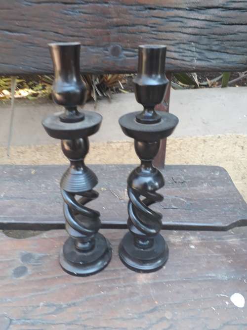 A PAIR (NOT MATCHING) OF EBONY? CANDLESTICK HOLDERS. NICE DETAIL