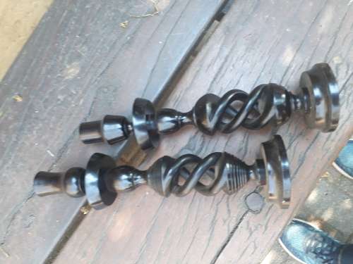 A PAIR (NOT MATCHING) OF EBONY? CANDLESTICK HOLDERS. NICE DETAIL