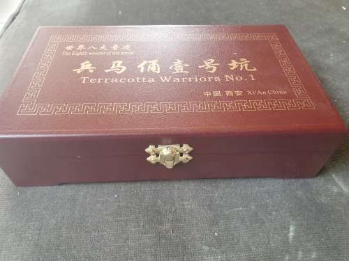 A BOXED SOUVENIR PLAQUE OR PAPERWEIGHT PIECE OF XI'AN CHINA TERRACOTTA WARRIOR NO 1