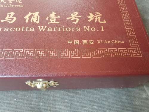A BOXED SOUVENIR PLAQUE OR PAPERWEIGHT PIECE OF XI'AN CHINA TERRACOTTA WARRIOR NO 1