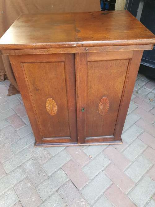 VINTAGE WOOD ETC SEWING CABINET WITH SOME FRONTAL RELIEF DETAIL