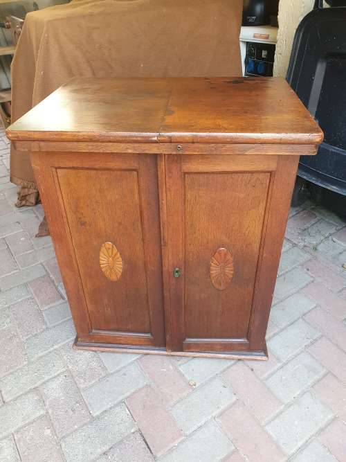 VINTAGE WOOD ETC SEWING CABINET WITH SOME FRONTAL RELIEF DETAIL