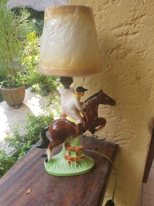 Very cute ceramic horse and rider lamp base plus shade working