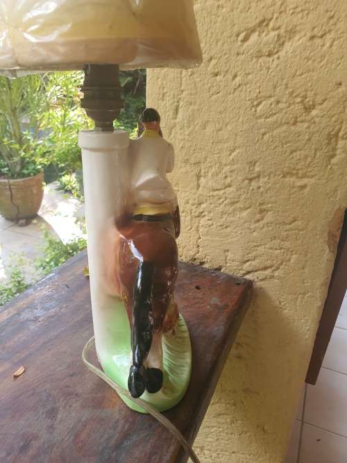 Very cute ceramic horse and rider lamp base plus shade working