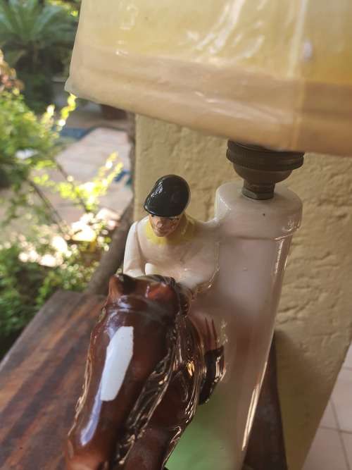 Very cute ceramic horse and rider lamp base plus shade working