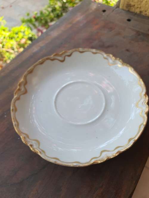 Vintage or antique Haviland Limoge France saucer, white scalloped with gilt pattern on border