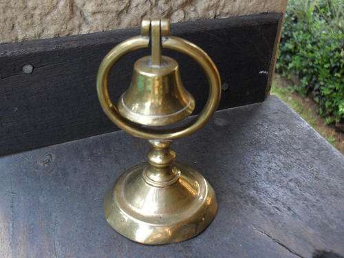GORGEOUS & USEFUL BELL ON STAND WITH SWINGING ACTION. IS LEADED AT BASE FOR STABILITY. NICE PIECE