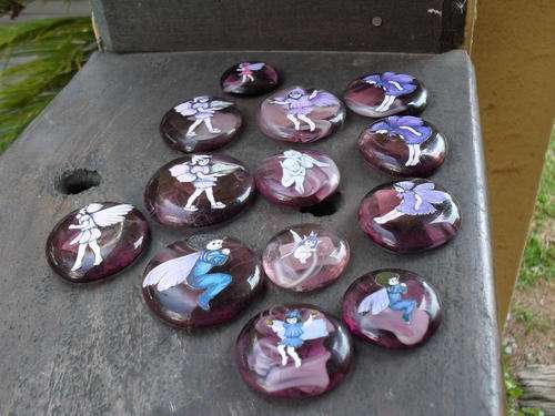 ORNAMENTAL GLASS STONES WITH VARIOUS FAIRIES & GOBLINS ETC ON THEM SELLING AS JOB LOT