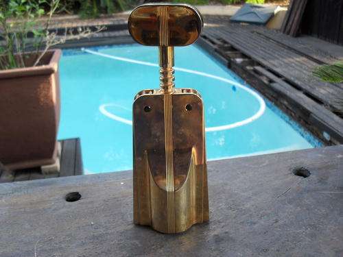 RATHER IMPRESSIVE & HEAVY ID CORKSCREW/BOTTLE OPENER  GOLD COLOURED. TAKE A LOOK!