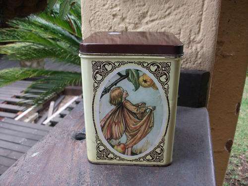 VINTAGE????? 4 DIFFERENT SIDES FAIRY TIN. NICE