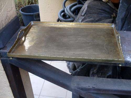 I FEEL IT IS VINTAGE. BEAUTIFUL SOLID BRASS INDIAN TRAY ON FEET. VERY WORTHWHILE
