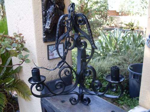 IN A NUTSHELL WROUGHT IRON THREE ARM CHANDELIER. VERY NICE!