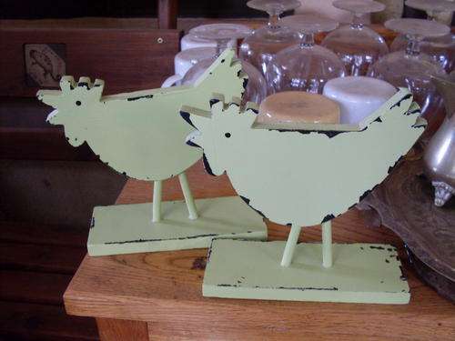 A PAIR OF DECORATIVE CHICKENS (SOME TYPE OF LIGHT WEIGHT WOOD?? OR SIMILAR). TOO CUTE