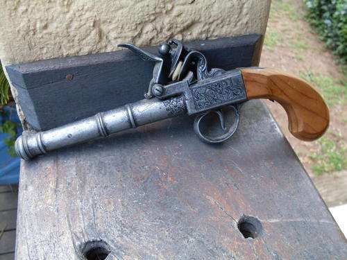 REPLICA / REPRODUCTION FLINTLOCK PISTOL TYPE WOOD & METAL HAS LONDON ON IT