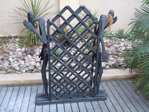 RATHER UNUSUAL & INTERESTING CARVED WOOD TRIBAL (AFRICAN) WINE RACK
