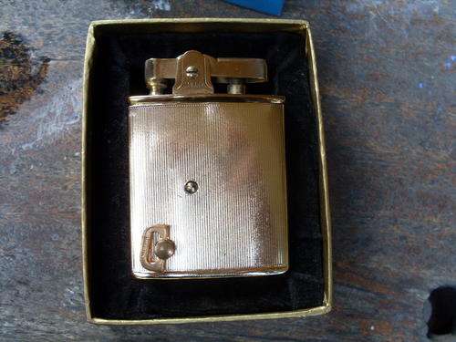 A VINTAGE RETRO?? CANARY BRAND SINGING LIGHTER. GOLD COLOURED. SUPER DIFFERENT PIECE 4 THE COLLECTOR
