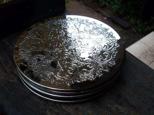 THESE ARE STUNNING. SET OF 6 SILVER PLATED?  RELIEF PATTERN PLACE SETTINGS OR TABLE MATS.. WOW!