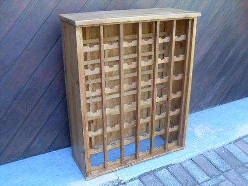 AN ABSOLUTELY BEAUTIFUL & VERY WORTHWHILE WOOD WINE RACK FOR 42 BOTTLES. WILL GRACE ANY HOME