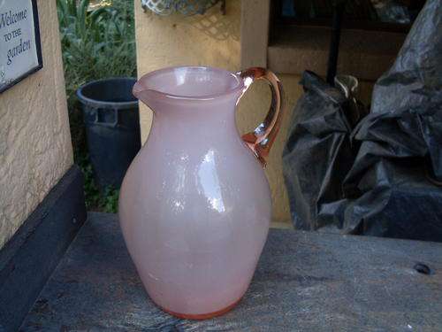 VERY PRETTY PINK GLASS JUG OR PITCHER WITH FROSTED LOOK INTERIOR. WITH FLAWS!