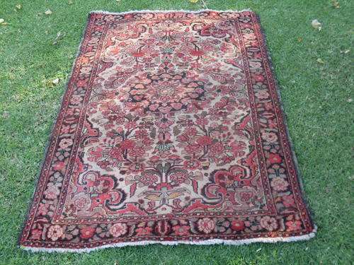 I THINK IT LOVELY. A PERSIAN TRIBAL RUG CURVILINEAR FLORAL DESIGN. LOVELY COLOURS & PATTERN