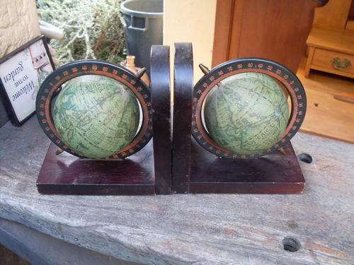 BELIEVED VINTAGE SET OF WORLD GLOBE BOOKENDS ON WOOD